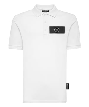 Descubre la versatilidad natural del polo, que lo convierte en la elección perfecta tanto para tus aventuras al aire libre como para tus momentos de ocio.   Corte holgado en piqué de algodón.   Los icónicos estampados Tiger y Brand en la parte delantera y trasera   Cuello con botones   Cuello y puños con remates de punto elástico   Parche engomado con el Tigre cosido sobre una cinta engomada en el pecho izquierdo   Dobladillo inferior cosido a dos agujas