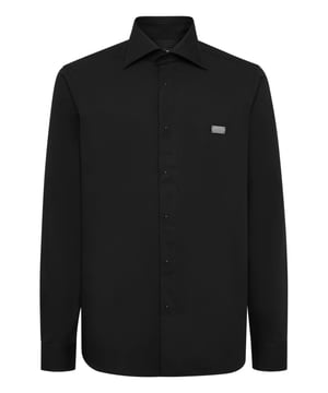 Add a whiff of uniqueness to your look with this cotton poplin shirt and... Find out what makes it one of a kind.   Cotton poplin   Collar: Napoli   Logoed metal badge at left chest   Concealed button placket decorated with Skull&Bones-shaped studs   Curved hem   Fit: Sugar Daddy