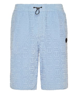 También nos preocupamos por su tiempo libre. Le recomendamos estos pantalones cortos de mezcla de algodón.   Esponja con dibujos láser   Parche con logotipo   Bolsillos con aberturas   Cintura elástica con cordón de ajuste