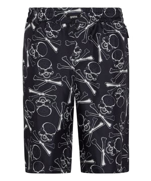 También cuidamos de su tiempo libre. Le sugerimos estas bermudas de seda bastante únicas.    Sarga de seda con estampado Skull&Bones.    Bolsillos con aberturas    Cintura elástica con cordón de ajuste