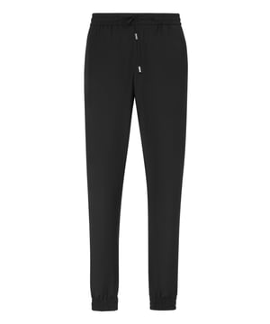 Refina tu ropa de ocio con estos pantalones de chándal de corte impecable, que combinan la lujosa suavidad de la lana virgen con la elegancia contemporánea.   Confeccionados en una mezcla de lana de primera calidad para un confort y una flexibilidad excepcionales.   Silueta relajada pero refinada perfecta para un estilo casual de lujo.   Forro suave que garantiza una mayor comodidad y transpirabilidad.   Fácil de combinar con elegantes zapatillas o calzado informal de lujo.   La artesanía característica de Philipp Plein fusiona ocio y sofisticación sin esfuerzo.