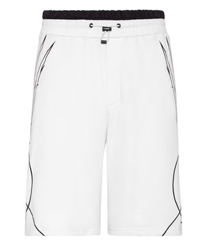 Estos pantalones cortos de jogging son el complemento perfecto para alcanzar tus objetivos. Comodidad y rendimiento se suman al estilo de Plein Sport.   Forro polar de algodón elástico   Cintura de punto elástico con cordón de ajuste y acabado de ribete de nailon   Raya de tigre en ambas piernas   Dos bolsillos con aberturas