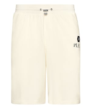 Ontdek de originaliteit van deze joggingbroek van gemêleerd katoenfleece versierd met unieke details.   Gemengd katoenen fleece   Oud verfeffect   Opdruk met logo   Steekzakken   Geribde tailleband met tunnelkoord
