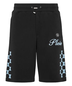 Ontdek de originaliteit van deze joggingbroek van melangekatoenfleece versierd met unieke details.   Gemengd katoenen fleece   Borduring en prints   Opdruk met logo   Steekzakken   Geribde tailleband met tunnelkoord