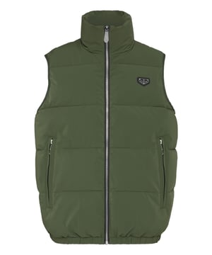 Esta versátil chaqueta chaleco de nailon combina estilo y funcionalidad, ofreciendo una capa ideal para las temporadas de entretiempo o para añadir calor sin abultar.    Confeccionada con poliéster duradero para ofrecer elasticidad y resistencia al agua.   Ligeramente acolchado con relleno de poliéster para una calidez esencial.   Cuello alto y cierre de cremallera completa para proteger del viento.   Bolsillos con cremallera para guardar lo esencial de forma segura.   Perfecta para llevar a capas sobre jerséis o sudaderas con capucha para un look contemporáneo e informal.