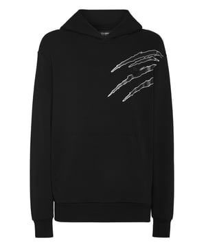 Personaliseer je actieve tijd met deze fleece hoodie. Een paar grafische elementen volstaan om de stijl van Plein Sport te definiëren. Kijk wat we voor dit seizoen hebben gemaakt.   Katoenen fleece met gegauzuurde binnenkant   Opgenaaide patch op de linkerborst   Spuitgegoten prints op de linkerborst en op de rug   Buidelzak   Ribgebreide zomen