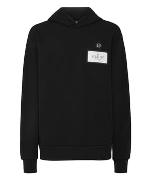 Define your style with a dash of personality. See this cotton fleece hoodie with distinctive details.   Soft cotton blend fleece   Label sewn at left chest   Logoed label sewn at left chest   Two slit pockets   Rib knit cuffs and bottom hem   Fit: Regular
