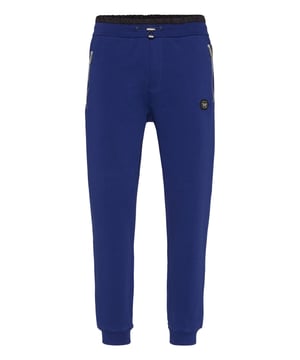 Discover the uniqueness of these cotton blend fleece jogging pants featuring special seams.   Cotton blend fleece   Logoed patch   Zip-up pockets   One rear pocket   Ribbed waistband with stop-cord drawstring   Rib knit bottom cuffs