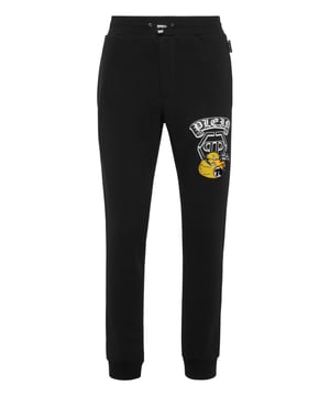 Discover the originality of these blend cotton fleece jogging pants decorated with unique details.   Blend cotton fleece   Pattern printed at left leg   Embroidered patch sewn at left leg   Logoed patch   Slit pockets    Ribbed waistband with stop-cord drawstring   Rib knit cuffs
