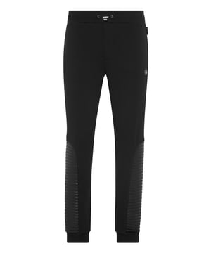 Discover the uniqueness of these cotton blend fleece jogging pants featuring special seams.   Cotton blend fleece   Quilted leatherette elements   Logoed patch   Two slit pockets   Ribbed waistband with stop-cord drawstring   Rib knit bottom cuffs