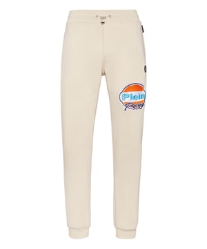 Discover the originality of these blend cotton fleece jogging pants decorated with unique details.   Blend cotton fleece   Embroidered details   Logoed patch   Slit pockets    Ribbed waistband with stop-cord drawstring   Rib knit cuffs