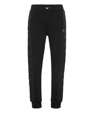 Discover the originality of these blend cotton fleece jogging pants decorated with unique seams.   Blend cotton fleece   Nylon padded details   Logoed patch   Slit pockets    Ribbed waistband with stop-cord drawstring   Rib knit cuffs