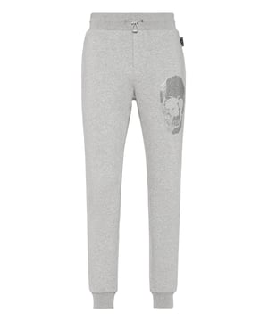 con cristales  Si lo suyo son los conjuntos deportivos con un toque de personalidad, eche un vistazo a estos joggers de forro polar en mezcla de algodón.   Vellón de algodón   Calavera enjoyada estampada en la pierna izquierda   Hexágono PP en una insignia de cuero saffiano cosida en la espalda   Bolsillos con aberturas   Cintura de punto elástico con cordón de tope   Puños inferiores de punto elástico