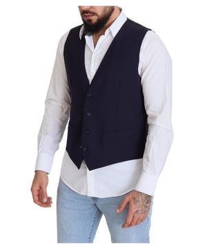 100% authentische Dolce & Gabbana Einreihige Kleiderweste.
  Dunkelblaue Farbe.
  Hergestellt in Italien.
  Logo-Details.
  Material: 98% Schurwolle 2% Elasthan.
  Futter: 70% Viskose 30% Cupro.