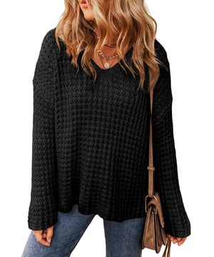 Black sweater with hollow
  out crochet detailing
  V
  neck design
  Made with high
  quality materials
  Comfortable and durable
  Suitable for any occasion