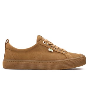 Jump into these Cariuma Oca Low trainers for eco-friendly style and comfort. These lace-up sneakers feature a soft suede upper, a cushioned memory foam insole for casual comfort, and a sturdy rubber sole for traction. Embrace fashion-forward, laid-back designs with a good conscience and enhance your wardrobe with these branded skater kicks.