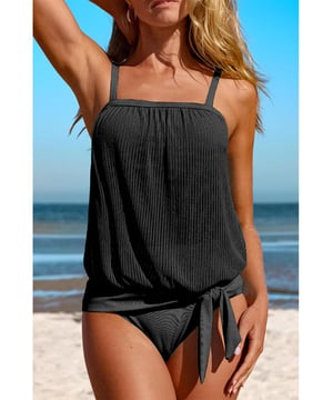 Trendy Black Striped Mesh Knotted Hem Tankini Swimsuit
  High
  rise design for easy wear
  Adjustable straps and removable padded cups for customizable support
  Versatile and functional for any beach or pool day
  Available in sizes S to 2XL with high elasticity
  Refer to the size chart for accurate sizing
Material: 82% Polyamide 18% Elastane