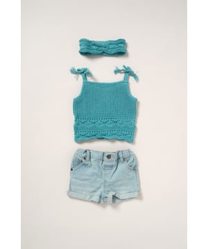 This adorable set by Miss includes a true knit top, denim shorts, and a matching headband. Perfect for warm days, it combines style and practicality, making it an ideal choice for playdates, outings, or casual summer looks.