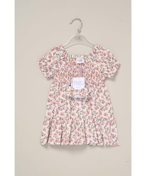 This printed summer dress and bow headband outfit set by Miss is the perfect addition to your little one’s summer wardrobe. The dress features tiered ruffles, cap sleeves, and a delicate floral print, creating a cute look perfect for sunny days, casual outings, or special occasions.