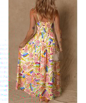 Orange abstract print maxi dress
  Spaghetti strap design
  Piping detail for added sophistication
  Maxi length for a graceful silhouette
  Perfect for showcasing a beautiful neckline
Material: 81% Viscose 19% Polyamide