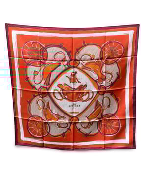 VINTAGE, RRP AS NEW
Hermes Paris Silk Scarf 'New Springs', designed by Dimitri Rybaltchenko, from the 2009 collection. It is a reinterpretation of Philippe Ledoux's classic 1974 Springs design. It depicts in its center the phaeton carriage belonging to Napoleon I's son. Main colors are red, white, orange and burgundy. Hand rolled hem. Fabric / Material: 100% Silk. Approx measurements: 35 x 35 inches - 88,8 x 88,8 cm. Condition Rating: A - EXCELLENTCondition Details: Gently used. Hermes tag still attached. Please check the photos carefully and ask if you need to know more details or if you have any doubts.  Box?: No Measurments:  length: 888 mm height: 888 mm