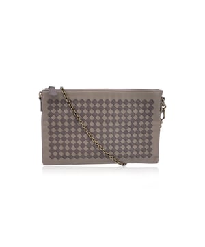 VINTAGE, RRP AS NEW
Elegant in its simplicity and rich in texture, this Bottega Veneta taupe leather zip pouch bag is a refined expression of the house's iconic craftsmanship. The front features Bottega's signature Intrecciato woven leather, a tactile nod to artisanal tradition, contrasted beautifully by the smooth leather body.  The bag opens with a sleek upper zipper closure, revealing a plush brown suede interior thoughtfully designed with six open side pockets and one larger slip pocket-perfectly organized for essentials. A removable gold-tone chain strap adds a touch of versatility and understated glamour.  Inside, the 'Bottega Veneta - Made in Italy' engraving stands as a quiet testament to its heritage-proof that timeless design never shouts, it whispers. Condition Rating: A - EXCELLENTCondition Details: Some light scratches on leather due to normal use. Please check the photos carefully and ask if you need to know more details or if you have any doubts.Measurements (cm):Depth: 2.5Height: 15.2Length: 24.1Other Details: Dustbag? YesKeys? NoBox? No Measurments:  width: 25 mm length: 241 mm height: 152 mm