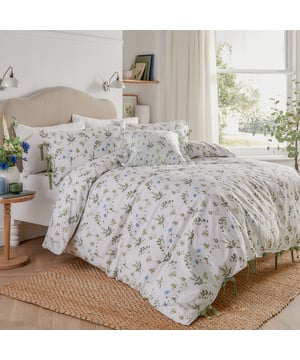 Transform your bedroom into a peaceful retreat with the Meadow Duvet Cover Set. Crafted from soft, tumbled cotton with a 144 thread count, it offers a luxuriously cosy feel that invites relaxation. The delicate meadow-inspired floral print, in soothing hues, brings the calming essence of nature into your space, making it perfect for those who value simple elegance and a connection to the natural world. Thoughtful touches like charming bow closures add both style and functionality, ensuring this duvet set complements a variety of interiors while providing a comforting sleep experience.