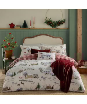 Take a stroll through the enchanting Cotswolds this festive season without leaving the comfort of home. This reversible duvet cover set beautifully captures the magic of Christmas in a rural English village, complete with glowing cottages and festive cheer that invite warmth into any room. On the other side, enjoy a classic gingham pattern for an effortlessly versatile look. Crafted from a durable and soft fabric blend, the set offers both comfort and practicality. Perfect for those who value stylish touches that express individuality, it transforms any bedroom into a cosy, refined retreat that impresses effortlessly.