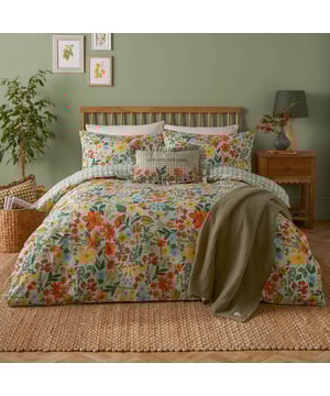 Bring the charm of an English summer into your home with the Meadow Haze Printed Duvet Cover Set. Its reversible design features a tranquil combination of delicate wildflowers swaying gently in the breeze and a subtle yet timeless pattern that embodies relaxed sophistication. Crafted from a durable polycotton blend, it offers both softness and practicality, making every night feel like a soothing retreat. This thoughtfully designed set marries classic elegance with a hint of countryside whimsy—a perfect choice for those who want to elevate their bedroom style while creating a welcoming and unique space that reflects their personality.