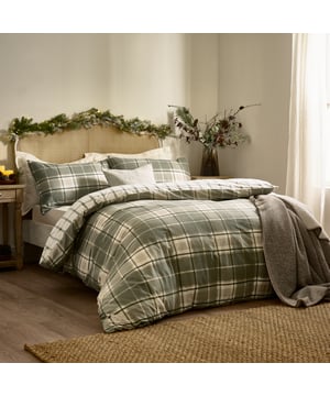 Add nostalgic country charm to your home with the Braemar check bedding, in timeless heritage shades. Crafted from luxuriously soft, brushed cotton, it offers an irresistibly warm and comforting feel, making it the perfect companion for chilly nights. The reversible tonal check adds versatility and style to any room, while the easy button closure ensures hassle-free use. Whether you’re curling up with a book or settling in for a restful night’s sleep, this duvet set delivers both comfort and understated elegance.