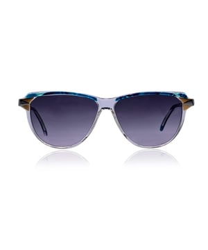 VINTAGE, RRP AS NEW
A bold blend of Italian artistry and early '90s glam, these vintage Fendi by Lozza sunglasses - Model FV 87, Color 813 - are a true collector's find. The striking blue-turquoise and clear acetate frame evokes summer skies and poolside days, while silver and gold metal detailing at the temples adds a luxe contrast that's pure Fendi finesse.  Signature FF logos grace the ear stems, a subtle flex of iconic branding. The original gradient grey lenses offer 100% total UVA/UVB protection, proving that style and substance can absolutely go hand-in-hand. Made in Italy with that unmistakable Fendi-Lozza craftsmanship, this model doesn't just complete an outfit - it tells a story.  A rare pop of color and class for those who like their vintage with a touch of bold. Condition Rating: A - EXCELLENTCondition Details: Gently used. Lenses and frame in excellent condition. Please check the images carefully. Some show arrows indicating any evident defect. Please ask if you need to know more details or if you have any doubts. Glasses maximum Width: 140mm Glasses Temple 135mm Glasses maximum lens width: 56mm Glasses maximum lens 45mm Glasses bridge width: 11mm Measurments:  length: 140 mm