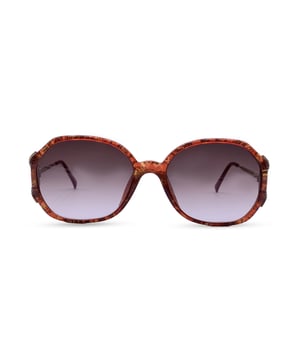 VINTAGE, RRP AS NEW
A bold nod to '80s elegance, these Vintage Christian Dior Women's Sunglasses, Model 2527 30, are a stunning expression of Dior's statement-making glamour. Crafted from lightweight Optyl in a rich burgundy acetate, the frame is elevated with sleek gold metal accents that shimmer with quiet confidence.  Sized at 58/18 130mm, they offer a flattering fit that feels both tailored and timeless. The classic CD logo graces the temples-a subtle reminder of couture lineage-while the original brown gradient lenses provide full 100% UVA/UVB protection.  Made for the woman who commands attention with elegance, Mod. 2527 is more than eyewear-it's wearable nostalgia, designed to turn heads.  Would you like it adjusted for a specific platform or Condition Rating: A - EXCELLENTCondition Details: Gently Used. Lenses and frame in excellent condition. Please check the images carefully. Some show arrows indicating any evident defect. Please ask if you need to know more details or if you have any doubts. Glasses maximum Width: 145mm Glasses Temple 130mm Glasses maximum lens width: 58mm Glasses maximum lens 50mm Glasses bridge width: 18mm Measurments:  width: 145 mm