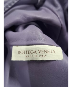 VINTAGE, RRP AS NEW
Add a splash of color to your accessory collection with the Bottega Veneta Mini Pouch in Pastel Purple Lambskin Leather. This beautifully crafted pouch features a soft leather body that feels luxurious to the touch, paired with a flat leather strap for easy wear. The magnetic closure ensures secure storage while maintaining a sleek, minimalist design. This mini pouch is the perfect accessory to complement a white flowy dress or a tailored pantsuit, adding a pop of pastel to your outfit. It can also be styled with a casual weekend look, such as a denim jacket and high-waisted jeans, for an effortlessly chic appearance. Ideal for both day-to-night wear, this versatile bag will bring a modern twist to your ensemble.
with Dust bag
Bottega Veneta Mini Pouch in Pastel Purple Lambskin Leather
Condition: Excellent
Signs of wear: No retail tag, No visible sign of wear., 
Packaging: Dust bag
Color: pastel purple
Material: Leather | leather
Size: One Size | One Size
Measurements: Width: 60; Height: 120; Length: 220; Handle drop: 630; Strap length: 1260
SKU: 468518 / NAPPUGBBA462920W
