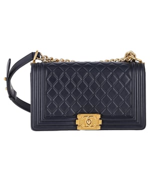VINTAGE, RRP AS NEW
The Chanel Medium Old Boy Shoulder Bag in navy blue calfskin leather is a refined, modern take on the iconic Boy bag, featuring the brand’s signature quilted pattern and bold metal accents. The rich navy hue adds a unique touch of sophistication, while the soft calfskin leather ensures durability and elegance. Style it with a tailored blazer and trousers for a chic, polished look, or pair it with a casual sweater and jeans to elevate your everyday outfits. The timeless design and versatile color make this bag a perfect accessory for both formal and casual occasions.

 Chanel Medium Old Boy Shoulder Bag in Navy Blue Calfskin Leather

Condition: Excellent
Signs of wear: No retail tag, No visible sign of wear., 
Packaging: Box
Color: Blue | navy blue
Material: Leather | calfskin leather
Size: One Size | One Size
Measurements: Width: 80; Height: 140; Length: 250; Handle drop: 0; Strap length: 1000
SKU: NAPPUGBBA465235W