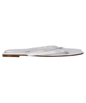 VINTAGE, RRP AS NEW
The Gianvito Rossi Flip Flop Sandals in white leather are the epitome of understated luxury, blending simplicity with impeccable Italian craftsmanship. Designed with sleek, refined straps and a minimalist silhouette, they offer both elegance and all-day comfort. The pristine white leather adds a crisp, modern finish that complements any summer wardrobe. **Styling tip:** Pair them with a tailored linen suit or a silky slip dress for a polished, effortlessly chic warm-weather look.

 Gianvito Rossi Flip Flop Sandals in White Leather

Condition: Excellent
Signs of wear: No visible sign of wear. No Mark at insole.,  Very light mark at soles.
Packaging: Dust bag
Color: White | ecru
Material: Leather | leather
Size: IT | 40.5
Measurements: Heel height: 10; Insole length: 270
SKU: NAPPUGBSH466915W
