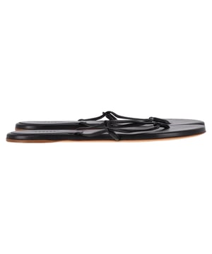 VINTAGE, RRP AS NEW
The Gabriela Hearst Flip Flop Sandals in black leather elevate a casual staple with refined minimalism and luxurious craftsmanship. Made in Italy from smooth, high-quality leather, they offer a sleek silhouette and a comfortable, barely-there feel. The clean lines and understated design make them a versatile choice for effortless, everyday elegance. **Styling tip:** Pair them with a linen maxi dress or tailored shorts and a silk tank for a relaxed yet sophisticated summer look.

 Gabriela Hearst Flip Flop Sandals in Black Leather

Condition: Excellent
Signs of wear: No visible sign of wear. No Mark at insole.,  Very light mark at soles.
Packaging: Dust bag
Color: Black
Material: Leather | leather
Size: IT | 40.5
Measurements: Heel height: 10; Insole length: 260
SKU: NAPPUGBSH466918W