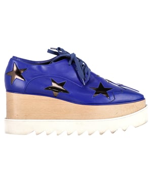 VINTAGE, RRP AS NEW
The Stella McCartney Elyse Platform Sneakers in blue leather redefine modern cool with their bold silhouette and sustainable craftsmanship. Featuring a striking layered platform sole and sleek faux leather upper, these sneakers make a powerful style statement without compromising on ethics. The vibrant blue hue adds a fresh pop to any outfit, blending edge with elegance. **Style tip:** Style them with cropped wide-leg trousers or a midi dress to showcase the platform and add an instant lift to your look—literally and stylistically.

 Stella Mccartney Elyse Platform Sneakers in Blue Leather

Condition: Very good
Signs of wear: Include Box., Minor markings, Lightly used but very well maintained. Minor mark at soles & creasing, light scuffing at the soles and heels.
Packaging: Box, Dust bag
Color: Blue |  blue
Material: Leather | leather
Size: EU | 37.5
Measurements: Heel height: 80; Insole length: 280
SKU: NAPPUGBSH470892W