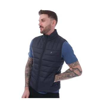 100% polyamide. Ontwerp: Geborduurd logo, Gewatteerd. Stoftechnologie: Waterafstotend. Gebonden armsgaten, gebonden zoom, kinbeschermer. Hals: Trechterhals. Mouwtype: Mouwloos. Geschikt: Regelmatig. Zakken: 2 zijzakken, fleece gevoerd, rits. Bevestiging: Volledige ritssluiting. S: 38 in. M: 40 in. L: 44 in. XL: 48 in. XXL: 52 in.