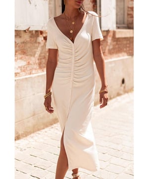 Chic and flattering pencil style
  Streamline tailored design
  V neck front and low scoop back
  Buttons front and ruched design
  Longline silhouette with slit
  High elasticity
  Detailed size chart provided
Material: 93% Viscose 7% Elastane