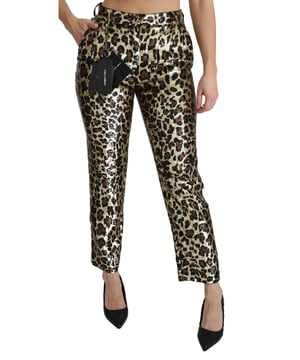 Completamente nuevo con etiquetas  
Hecho en Italia  
Cintura alta  
Ajuste regular  
Material: 71% PVC, 15% seda, 9% poliéster, 1% elastano  
Color: Leopardo dorado y marrón con lentejuelas  
Cierre de cremallera y botón  
Detalles del logotipo  
Tamaño de etiqueta IT38 / US4