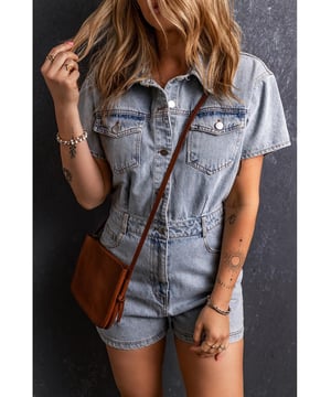 Our styles are designed with a trendy fitted look in mind following an international size standard. For the best fit we suggest choosing one size up from your usual. Be sure to check our sizing chart to find your perfect match!
  Classic denim fabric with a washed finish
  Buttons along the front for a stylish and practical look
  Adjustable buttons for versatility in style
  Practical and decorative pocket design
  Chic and durable denim style
Material: 71% Cotton 27.5% Polyester 1.5% Elastane