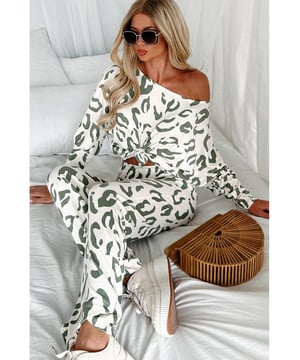 Our styles are designed with a trendy fitted look in mind following an international size standard. For the best fit we suggest choosing one size up from your usual. Be sure to check our sizing chart to find your perfect match!
  Beige leopard animal print long sleeve and pants loungewear set
  Soft and cozy material
  Perfect for relaxing at home or running errands
  Long sleeve top and matching pants for a coordinated look
  Ideal for lounging sleeping or casual outings
  Suitable for ladies of different shapes and ages