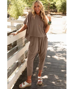 Soft and stretchy material for all
  day comfort
  Relaxed and loose fit for ultimate boho style
  Slouchy swingy top with dropped shoulders and loose short sleeves
  High
  low bottom edge on top
  Matching high
  rise pants with elastic drawstring waistband
  Dropped crotch and exposed seams on pants
  Casual and fashionable
  Please refer to size chart for accurate sizing