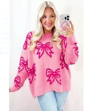 Feminine bow pattern
  Loose fit suitable for all body shapes
  Drop shoulder design for a laid
  back look
  Soft and warm knit material
  Ideal for cold winter season