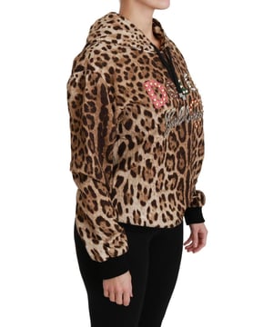 Precioso a estrenar con etiquetas.
  Fabricado en Italia.
  Estampado de leopardo marron con forro interior de seda.
  Manga larga y capucha.
  Material: 67% viscosa 33% algodon.
  Bordado: 25% Ayers 35% plastico 20% laton 20% cuero.
  Detalles del logoti.