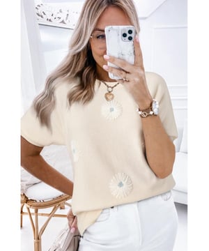 Our styles are designed with a trendy fitted look in mind following an international size standard. For the best fit we suggest choosing one size up from your usual. Be sure to check our sizing chart to find your perfect match!
  Beige flower pattern short sleeve knitted top
  Soft and cozy knitted fabric
  Stylish short sleeves
  Classic crew neck design
  Available in sizes S M L and XL
  High elasticity for a comfortable fit
Material: 50% Viscose 28% Polyester 22% Polyamide