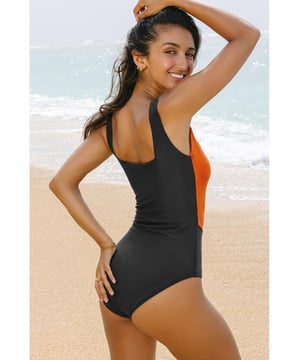 Our styles are designed with a trendy fitted look in mind following an international size standard. For the best fit we suggest choosing one size up from your usual. Be sure to check our sizing chart to find your perfect match!
  Colorblock silhouette for a stylish look
  Square neck design
  Removable bust pads for customizable support
  Full coverage for a flattering fit
  High elasticity for comfortable wear
Material: 82% Polyamide 18% Elastane