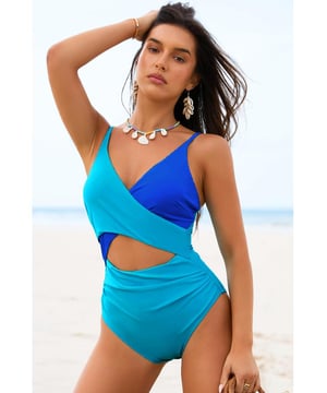 Our styles are designed with a trendy fitted look in mind following an international size standard. For the best fit we suggest choosing one size up from your usual. Be sure to check our sizing chart to find your perfect match!
  Light Blue Crossover Colorblock Cutout One Piece Swimsuit
  Chic color block design
  Crossover bust with cut
  out front
  Flattering fit to show sexy curves and long legs
  Adjustable spaghetti straps
  Open back for added sexiness
  High elasticity for a comfortable fit
Material: 82% Polyamide 18% Elastane
