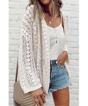 White Stylish Hollow Out Knit Drop Shoulder Cardigan
  Timeless elegance with intricate hollow out design
  Knit construction for comfort and warmth
  Drop shoulder style for a relaxed chic vibe
  Captivating patterns and textures
  Refer to size chart for perfect fit
Material: 55% Acrylic 45% Cotton