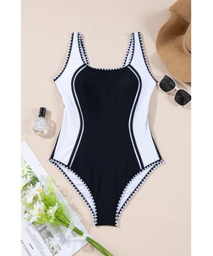 Our styles are designed with a trendy fitted look in mind following an international size standard. For the best fit we suggest choosing one size up from your usual. Be sure to check our sizing chart to find your perfect match!
  Color block design
  Ric rac trim details
  Sexy U
  neckline
  Slim fit silhouette
  High elasticity for comfort
  Ideal for beach activities
Material: 82% Polyamide 18% Elastane